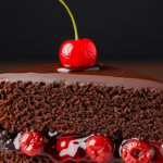 Slice Of Chocolate Cake With Cherry Filling