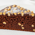 Slice Of Chocolate Cake With Nuts