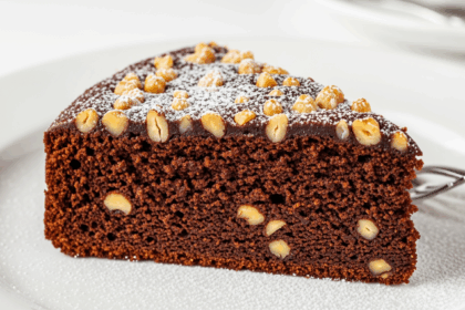 Slice Of Chocolate Cake With Nuts