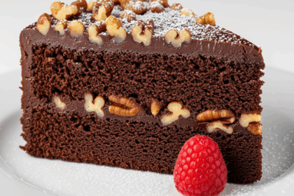 Chocolate Cake With Nuts On Plate