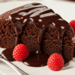 Cake With Chocolate Sauce On Plate