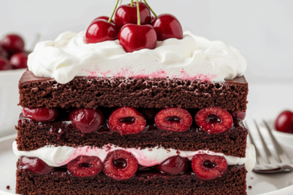Chocolate Cake With Cherries And Whipped Cream