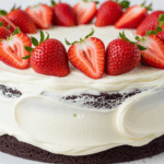 Chocolate Cake With Vanilla Frosting And Strawberries