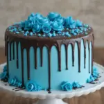 Chocolate Drip Cake With Blue Decorations