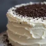 White Frosted Cake With Chocolate Shavings