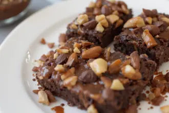 Chocolate Brownies With Nuts And Sauce