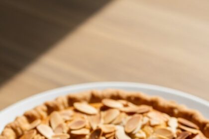 Apple Pie With Almonds On Plate