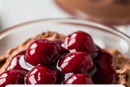Chocolate Mousse Dessert With Cherry Sauce