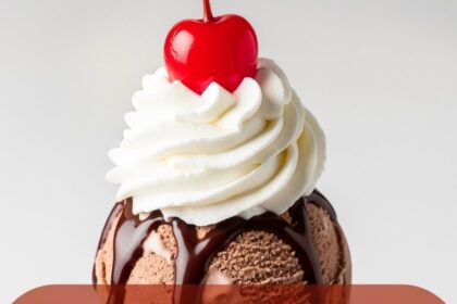 Ice Cream Sundae With Whipped Cream And Chocolate