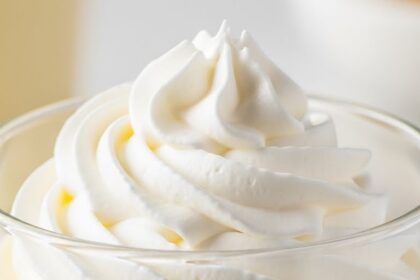 Glass Of Vanilla Pudding With Whipped Cream