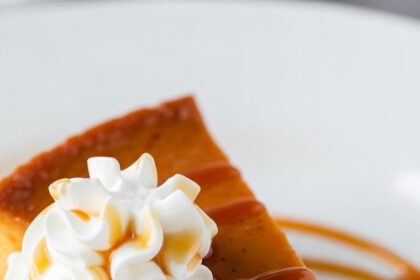 Slice Of Flan With Whipped Cream