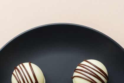 White Chocolate Truffles With Black Drizzle