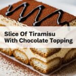 Slice Of Tiramisu With Chocolate Topping