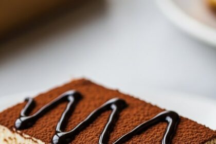 Slice Of Tiramisu With Chocolate Topping